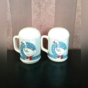 VINTAGE PAIR OF CERAMIC BLUE BOW GOOSE DUCK SALT AND PEPPER SHAKERS